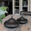 Black metal jar with Moroccan-style silhouette