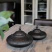 Black metal jar with Moroccan-style silhouette