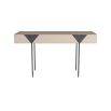 Desk encased in grey leather balancing on blade-like bronze legs
