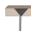 Desk encased in grey leather balancing on blade-like bronze legs