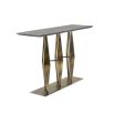 Console table with black marble top and sculptural gold base