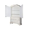 A Scandinavian inspired, hand carved white cabinet with two doors, adjustable shelving and three drawers 