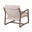 Cosy, neutral armchair with sleek wooden frame and linen seat cushions