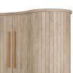 Elegant curved wooden cabinet with panel details and brass accents