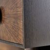 Low-standing cabinet with beautiful eucalyptus wood veneer and circular handle