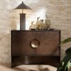 Low-standing cabinet with beautiful eucalyptus wood veneer and circular handle