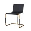 Dark navy leather chair with gleaming gold metal frame 