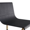 Dark navy leather chair with gleaming gold metal frame 