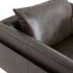 Armchair in brown leather in angular frame