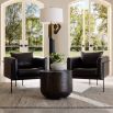 Armchair in brown leather in angular frame
