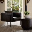 Armchair in brown leather in angular frame