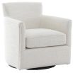 The Paxford Swivel Chair, with its traditional silhouette and off-white fabric upholstery, exudes timeless style and minimal elegance.
