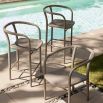 Elevate your outdoor space with the Feller Outdoor Counter Stool, combining stylish design and durable materials for comfort and elegance.