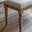 Lime wash wooden bench with bobble effect legs