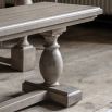 Rustic and sophisticated dining bench with detailed legs