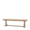 Rustic and sophisticated dining bench with detailed legs