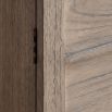 Wooden two door cupboard with rattan detailing