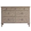 Light wooden seven drawer chest of drawers