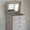 Tall light wooden five drawer chest