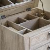 Tall light wooden five drawer chest