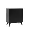Black framed three drawer chest table with natural rattan fronted drawers