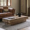 Rectangular coffee table designed to look like solid blocks of cross-sawn timber