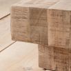Rectangular coffee table designed to look like solid blocks of cross-sawn timber