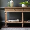 Lightly brushed console table crafted from Mindy wood with a stunning inlaid parquet-style design