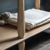 Lightly brushed console table crafted from Mindy wood with a stunning inlaid parquet-style design