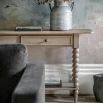 Lime wash wooden console table with bobble effect legs