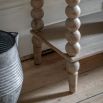 Lime wash wooden console table with bobble effect legs
