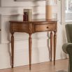 Semi-circular wooden side table with traditional detailing