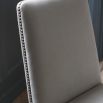 Minimalist upholstered dining chair in cream