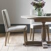 Minimalist upholstered dining chair in cream