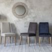 Minimalist upholstered dining chair in cream