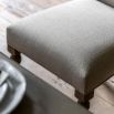 Lime wash wooden dining chair with upholstered seat and bobble effect legs