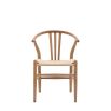 Wishbone back dining chairs with deeply curved back and distinctive hand woven seat