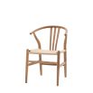 Wishbone back dining chairs with deeply curved back and distinctive hand woven seat