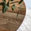 Slatted base circular dining table featuring 2 handy shelves