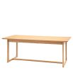 Wooden dining table with shaped underframe