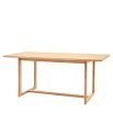 Wooden dining table with shaped underframe