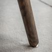 Triangular wooden dining table with three legs