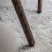 Square wooden dining table with four legs