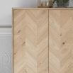 Warm wooden cocktail cabinet with chevron design