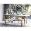 Warm wooden extendable dining table with chevron design