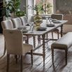 Extendable rectangular dining table with bobble effect legs