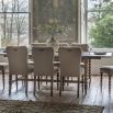 Extendable rectangular dining table with bobble effect legs