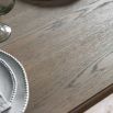 Extendable rectangular dining table with bobble effect legs