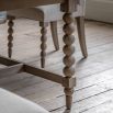 Extendable rectangular dining table with bobble effect legs
