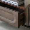 Dark wood media unit with arch patterns and round ball feet